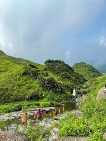 Du Gia Waterfall surrounded by green valley in Ha Giang