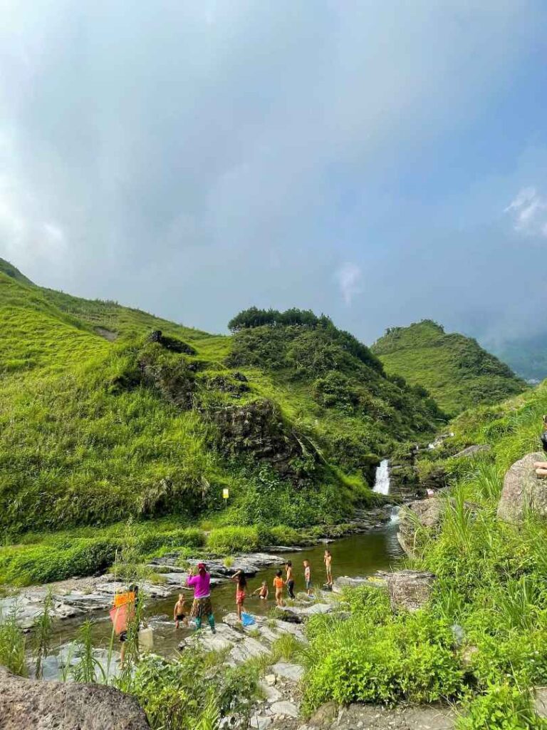 Du Gia Waterfall surrounded by green valley in Ha Giang