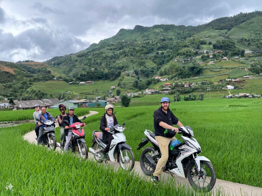 Riders starting their Ha Giang Loop motorbike journey from Sapa, passing mountains and ethnic villages