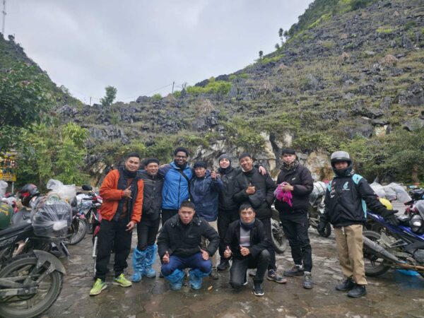 Group of tour guides and tourists during Ha Giang motorbike tour